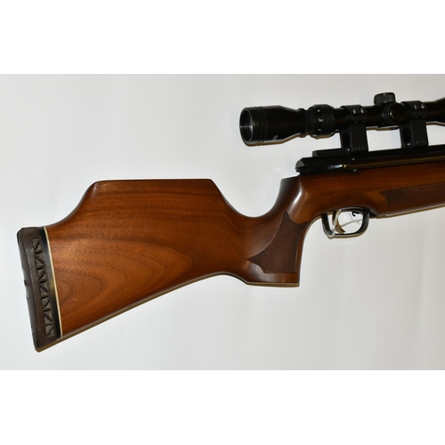 299 - AN AIR ARMS SE90 .22 SIDE LEVER AIR RIFLE, serial no. 43889, fitted with a Tasco 3-9 x 40 scope and ... 