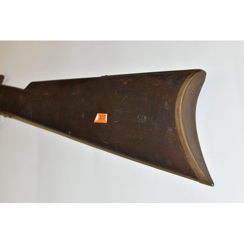 300 - A REPRODUCTION OF A FLINTLOCK RIFLE, lacks ram rod, non-firing, overall length 134cm, rusted conditi... 