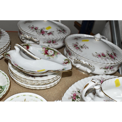 422 - A QUANTITY OF ROYAL ALBERT 'LAVENDER ROSE' PATTERN DINNERWARE, comprising a large oval meat plate (m... 