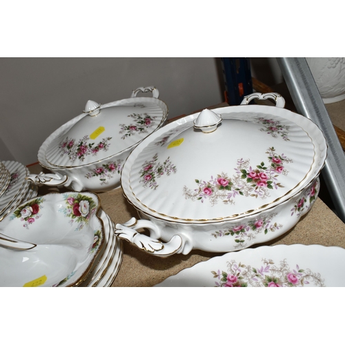 422 - A QUANTITY OF ROYAL ALBERT 'LAVENDER ROSE' PATTERN DINNERWARE, comprising a large oval meat plate (m... 