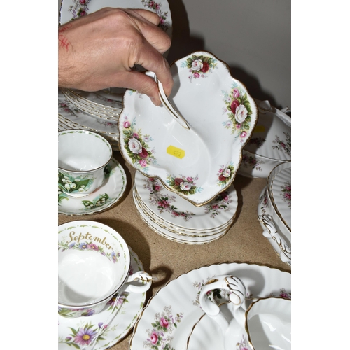 422 - A QUANTITY OF ROYAL ALBERT 'LAVENDER ROSE' PATTERN DINNERWARE, comprising a large oval meat plate (m... 