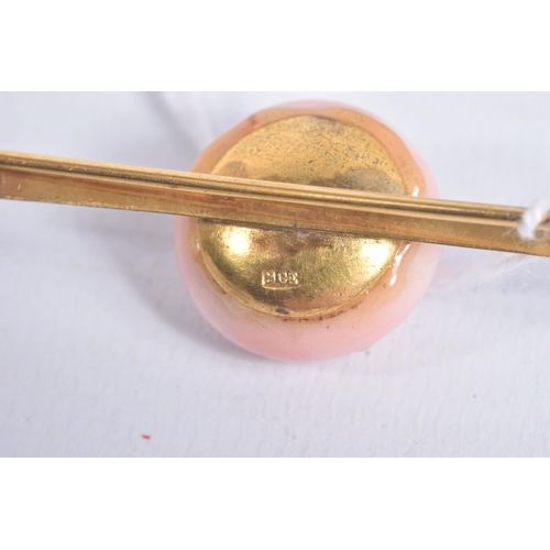 1 - A BAR BROOCH AND MATCHING EARRINGS, the yellow metal brooch set with a pink glass cabochon, fitted w... 