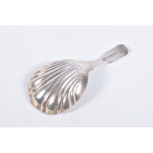 104 - AN EARLY 19TH CENTURY SILVER CADDY SPOON, with shell design gilt bowl, with leopard head engraved to... 