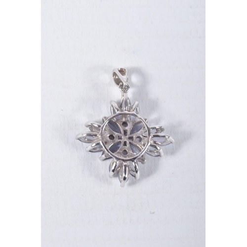 16 - A GEM SET PENDANT AND A PAIR OF EARRINGS, the 9ct white gold pendant of a star design, set with marq... 