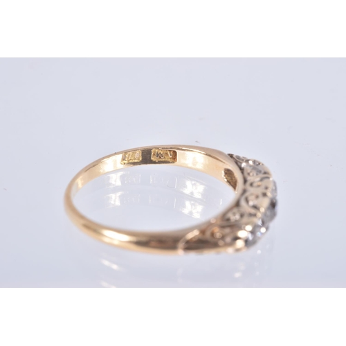 19 - A YELLOW METAL FIVE STONE DIAMOND RING, set with five graduated old cut diamonds, each claw set in a... 