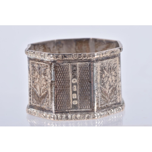 30 - A PAIR OF LATE VICTORIAN SILVER OCTAGONAL NAPKIN RINGS, alternate engine turned and engraved panels,... 