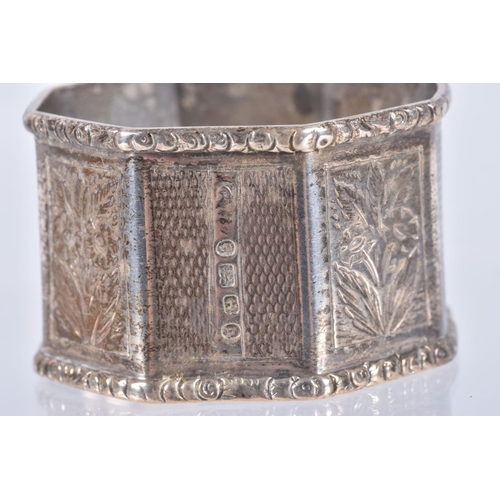 30 - A PAIR OF LATE VICTORIAN SILVER OCTAGONAL NAPKIN RINGS, alternate engine turned and engraved panels,... 