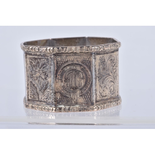 30 - A PAIR OF LATE VICTORIAN SILVER OCTAGONAL NAPKIN RINGS, alternate engine turned and engraved panels,... 