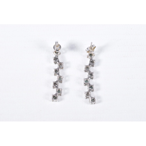 33 - A PAIR OF 9CT WHITE GOLD DIAMOND DROP EARRINGS, each earring set with a row of illusion set round br... 