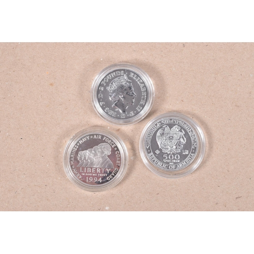 45 - THREE COINS, to include a commemorative 2 pound coin, for year of the rat 2020, a Liberty 1994 one d... 