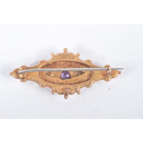 57 - AN EARLY 20TH CENTURY 9CT GOLD GEM SET BROOCH, set with a central heart cut amethyst, flanked with s... 