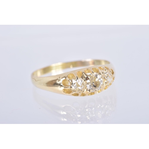 58 - A YELLOW METAL THREE STONE DIAMOND RING, set with three old cut diamonds, estimated total diamond we... 