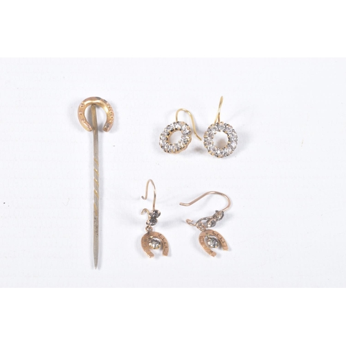 63 - THREE ITEMS OF EARLY TO MID 20TH CENTURY JEWELLERY, to include a horse shoe stickpin, stick believed... 