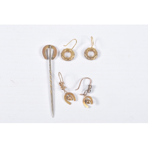 63 - THREE ITEMS OF EARLY TO MID 20TH CENTURY JEWELLERY, to include a horse shoe stickpin, stick believed... 