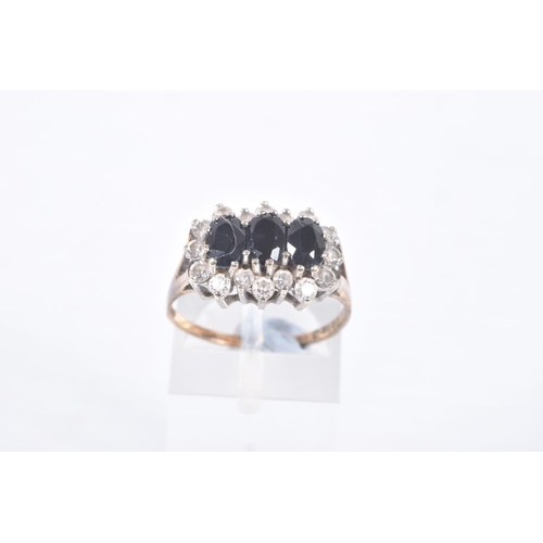 64 - TWO 9CT GOLD SAPPHIRE DRESS RINGS, the first designed as a circular sapphire within a single cut dia... 