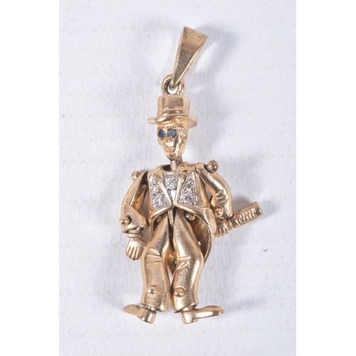 68 - A 9CT GOLD ARTICULATED MAN PENDANT, gentlemen holding a bottle with top hat on, set with blue paste ... 