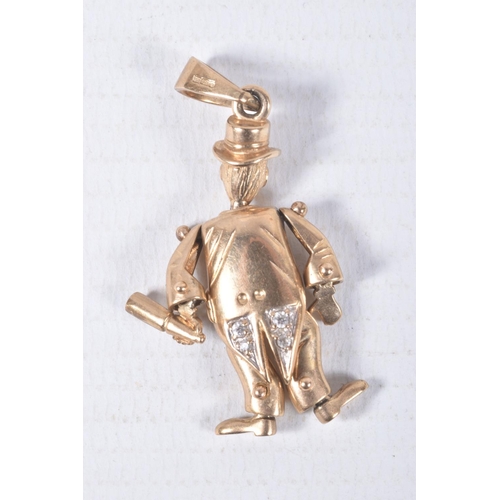 68 - A 9CT GOLD ARTICULATED MAN PENDANT, gentlemen holding a bottle with top hat on, set with blue paste ... 