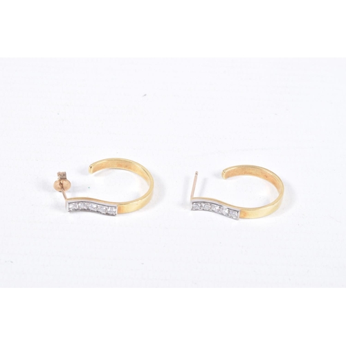 74 - A PAIR OF YELLOW METAL AND DIAMOND HOOP EARRINGS, five round brilliant cut diamonds, grain set in wh... 