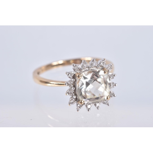 77 - A 9CT GOLD GEM SET RING, a square cut light yellow quartz, set with a halo of single cut diamonds, h... 