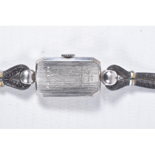 80 - A 'JAEGER LE-COULTRE' LADYS WRISTWATCH, hand wound movement, discoloured rectangular dial, signed 'J... 