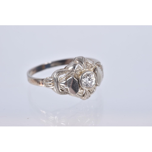 83 - A SINGLE STONE DIAMOND RING, designed as a central old cut diamond within a pierced geometric style ... 