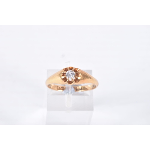 85 - AN EARLY 20TH CENTURY, 18CT GOLD RING, centring on a circular cut colourless stone, assessed as spin... 