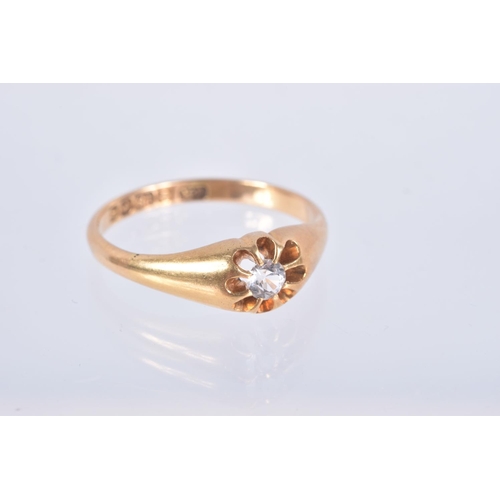 85 - AN EARLY 20TH CENTURY, 18CT GOLD RING, centring on a circular cut colourless stone, assessed as spin... 