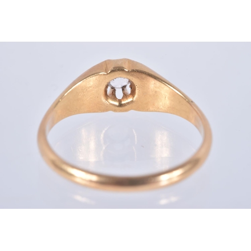 85 - AN EARLY 20TH CENTURY, 18CT GOLD RING, centring on a circular cut colourless stone, assessed as spin... 