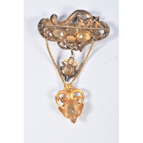 86 - A VICTORIAN YELLOW METAL CITRINE DROP BROOCH, scrolling foliate brooch set with oval and square cut ... 