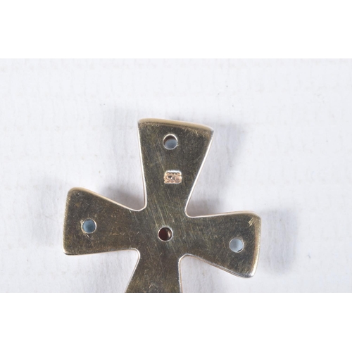 88 - A YELLOW METAL CROSS PENDANT, polished cross set with a central garnet cabochon and four blue topaz ... 