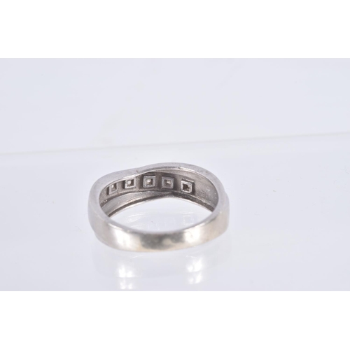 9 - A 9CT WHITE GOLD DIAMOND RING, crossed band design set with a row of five small round brilliant cut ... 