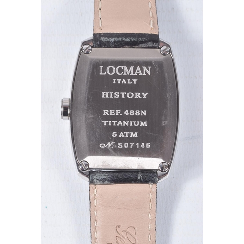 92 - A 'LOCMAN ITALY' WRISTWATCH, quartz movement, silvered dial, signed 'Locman Italy, History Patented'... 