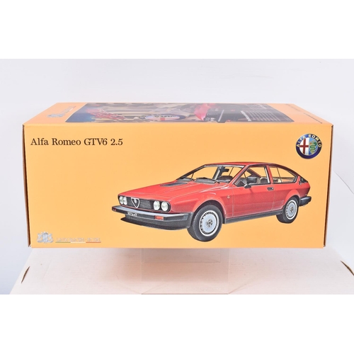 153 - TWO BOXED LIMITED EDITION  LAUDORACING 1:18  SCALE  MODEL VEHICLES, the first is a Fiat 131 Abarth, ... 