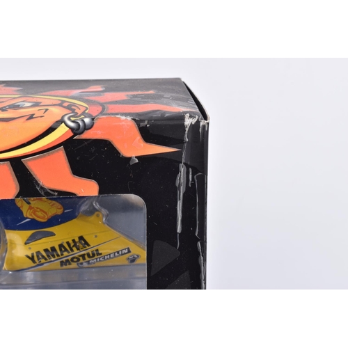 165 - TWO BOXED MINICHAMPS 1:12 SCALE VALENTINO ROSSI COLLECTION MODEL MOTORCYCLES, the first is a Yamaha ... 