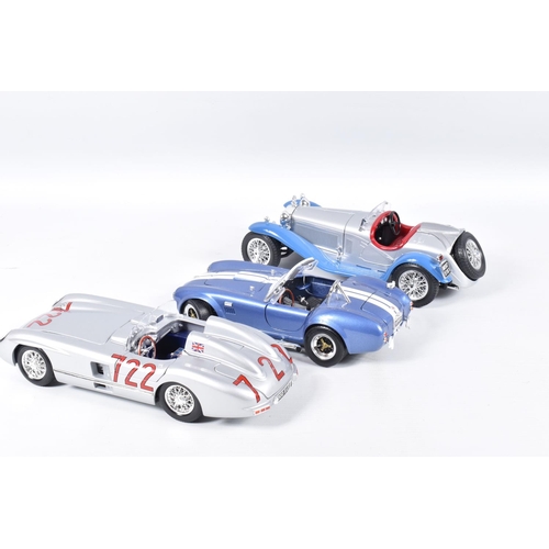 200 - A COLLECTION OF UNBOXED 1/18 SCALE DIECAST AND PLASTIC CAR MODELS, assorted models by Sun Star, Yat ... 