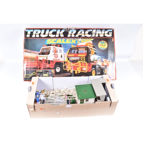 205 - A BOXED SCALEXTRIC TRUCK RACING SET, No.C551, not tested, appears largely complete with both trucks ... 