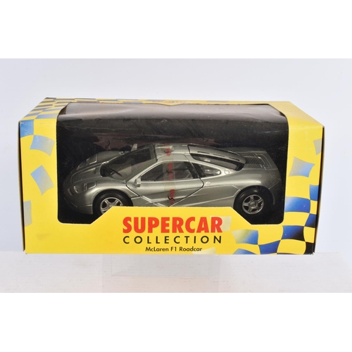 223 - FIVE BOXED DIECAST MODEL VEHICLES, to include a Maisto Supercar collection Mclaren F1 Road car, silv... 