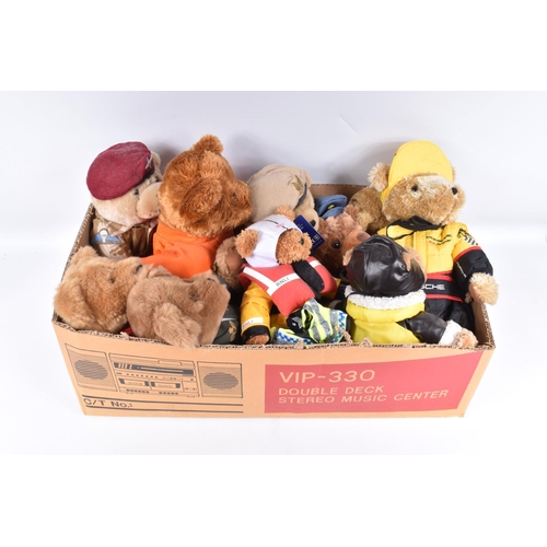 228 - A COLLECTION OF MODERN TEDDY BEARS, majority wearing uniform or motor racing suits, all appear large... 