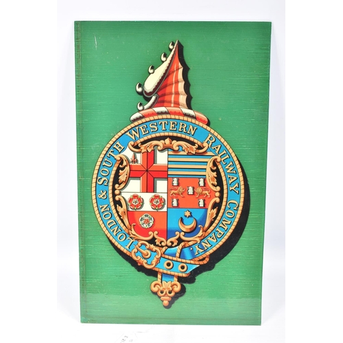 373 - A LONDON & SOUTH WESTERN RAILWAY COMPANY COAT OF ARMS TRANSFER, varnished and mounted on a plastic p... 