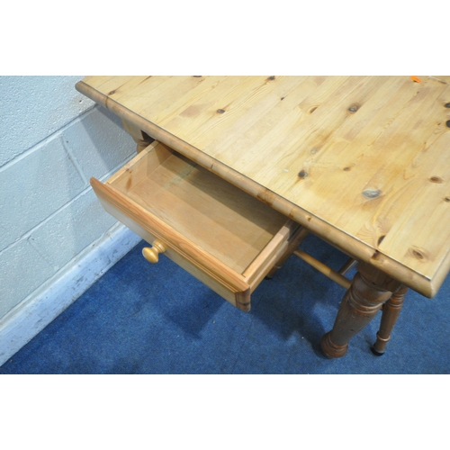 1222 - A MODERN PINE FARMHOUSE STYLE TABLE, with a single drawer to one end, on turned legs, length 150cm x... 