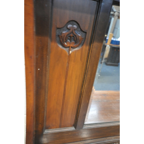 1236 - AN ARTS AND CRAFTS OAK MIRROR BACK SIDEBOARD, with central bevelled mirror, above two drawers and cu... 