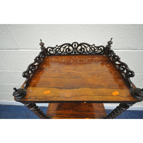 1261 - A  VICTORIAN ROSEWOOD THREE TIER WHATNOT, with a scrolled pierced gallery top, barley twist supports... 