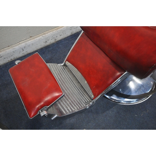 1268 - A PAIR OF RETRO BARBERS CHAIRS, with red leatherette upholstery, on a chrome base height adjustable ... 