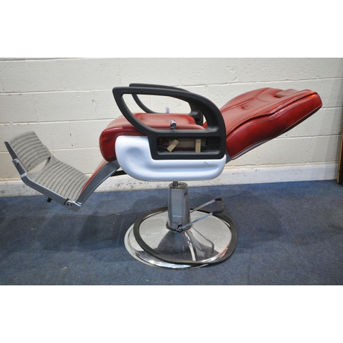 1268 - A PAIR OF RETRO BARBERS CHAIRS, with red leatherette upholstery, on a chrome base height adjustable ... 