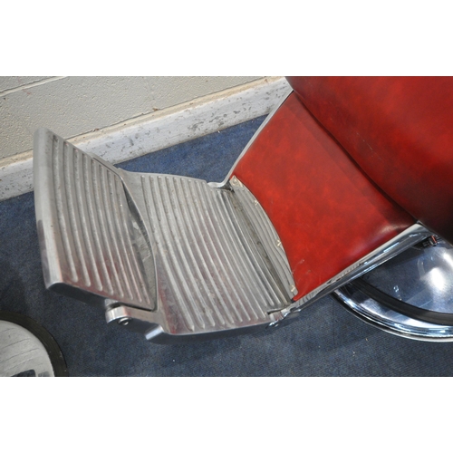 1268 - A PAIR OF RETRO BARBERS CHAIRS, with red leatherette upholstery, on a chrome base height adjustable ... 