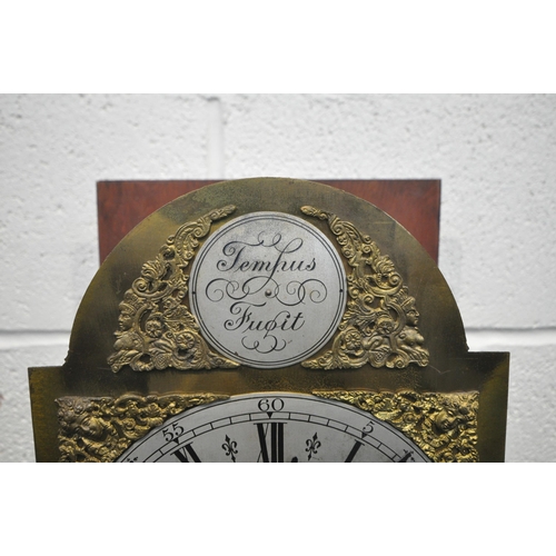 1277 - A 20TH CENTURY MAHOGANY TEMPUS FUGIT LONG CASE CLOCK, the arched dial enclosing a seven inch brass a... 