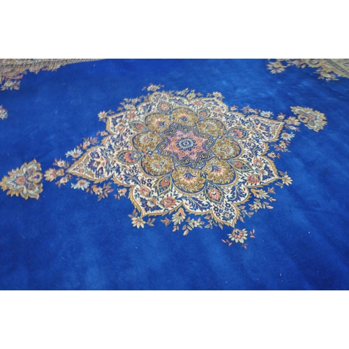 1282 - A 20TH CENTURY LOUIS DE POORTERE KANDAHAR WORSTED WOOL RUG, with a blue field, central medallion and... 