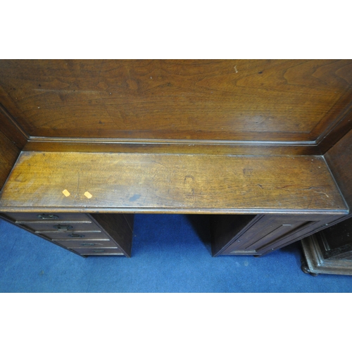 1311 - AN EARLY 20TH CENTURY WALNUT BUREAU BOOKCASE, the double bevelled glass doors enclosing an arrangeme... 