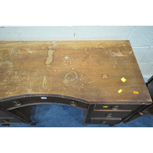 1324 - A 20TH CENTURY MAHOGANY DESK, fitted with seven drawers, on cylindrical tapered legs, width 119cm x ... 