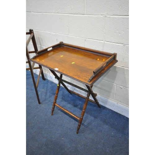 1327 - A 19TH CENTURY MAHOGANY FOLDING TRAY TABLE, with twin handles, on a turned base, width 74cm x depth ... 